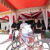 Lepas Kotamobagu Fun Bike 2022, Wali Kota Tatong Bara Ikut Serahkan Doorprize 1 Unit Sepeda