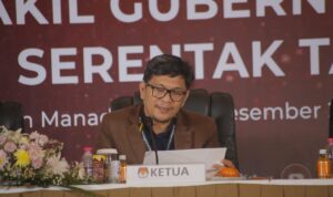 Ketua KPU Sulut Kenly Poluan saat membacakan tatib rapat pleno terbuka