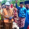 Bupati Limi Mokodompit Letakkan Batu Pertama Pembangunan Bantuan Rumah Rehabilitasi di Solimandungan Baru