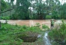 Volume Air  Sungai Tuodan Naik Drastis, Petani di Langagon Tak Bisa Pulang